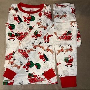 The Children's Place Red and White Pajama Set with Festive Santa Print